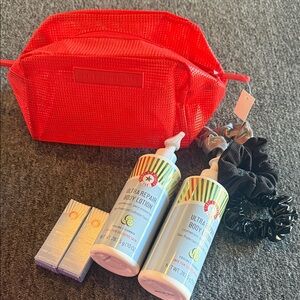 First Aid Beauty Ultra Repair Body Lotion Set with Red Bag and Accessories
